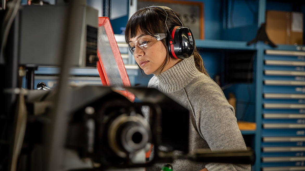 Woman working in the metal shop at the Autodesk Technology Center in San Francisco